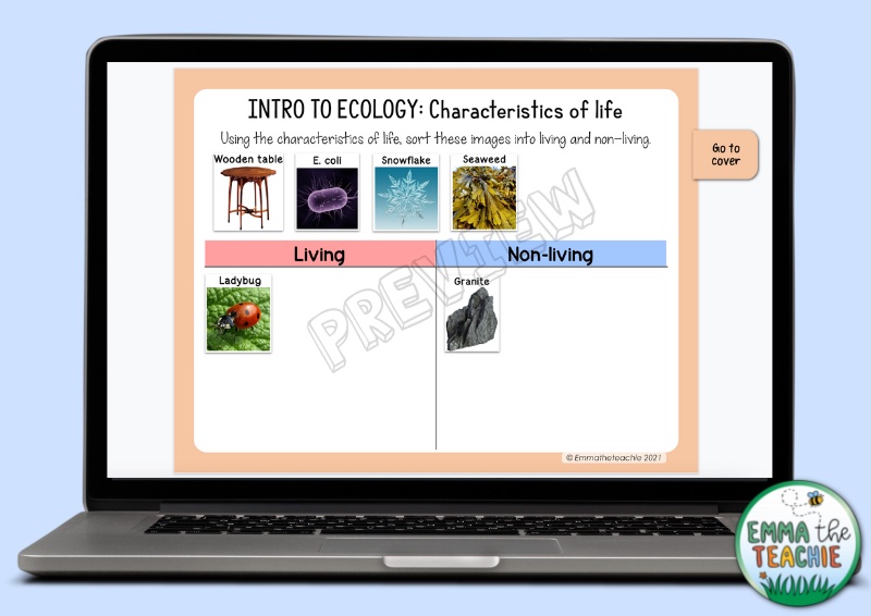 A laptop showing a page from an ecology-themed digital interactive notebook. The activity is sorting images into living and non-living based on the characteristics of life.