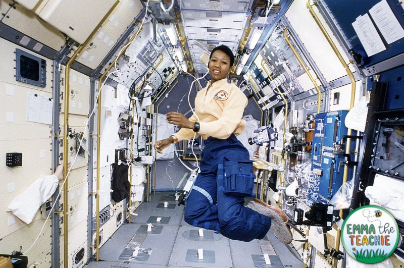An image of Mae Jemison, an African American woman, floating inside the space station.