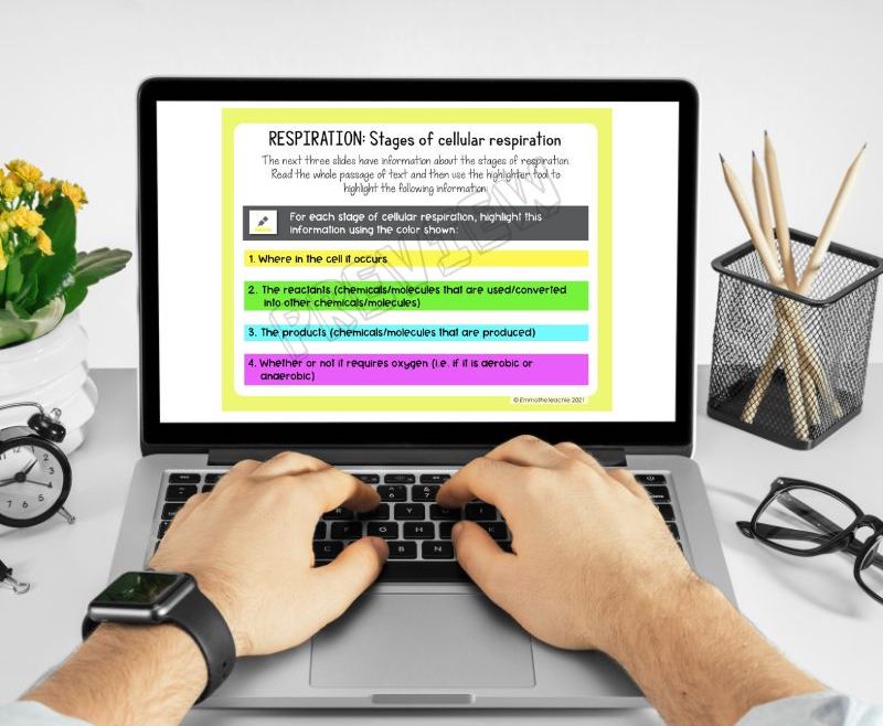 A pair of hands working on a laptop. The screen is showing a slide from the Cell Respiration Google Slides presentation. On this slide, students must read a passage and highlight specific information in different colors.
