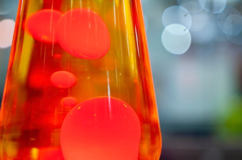 An image with a portion of an orange lava lamp.